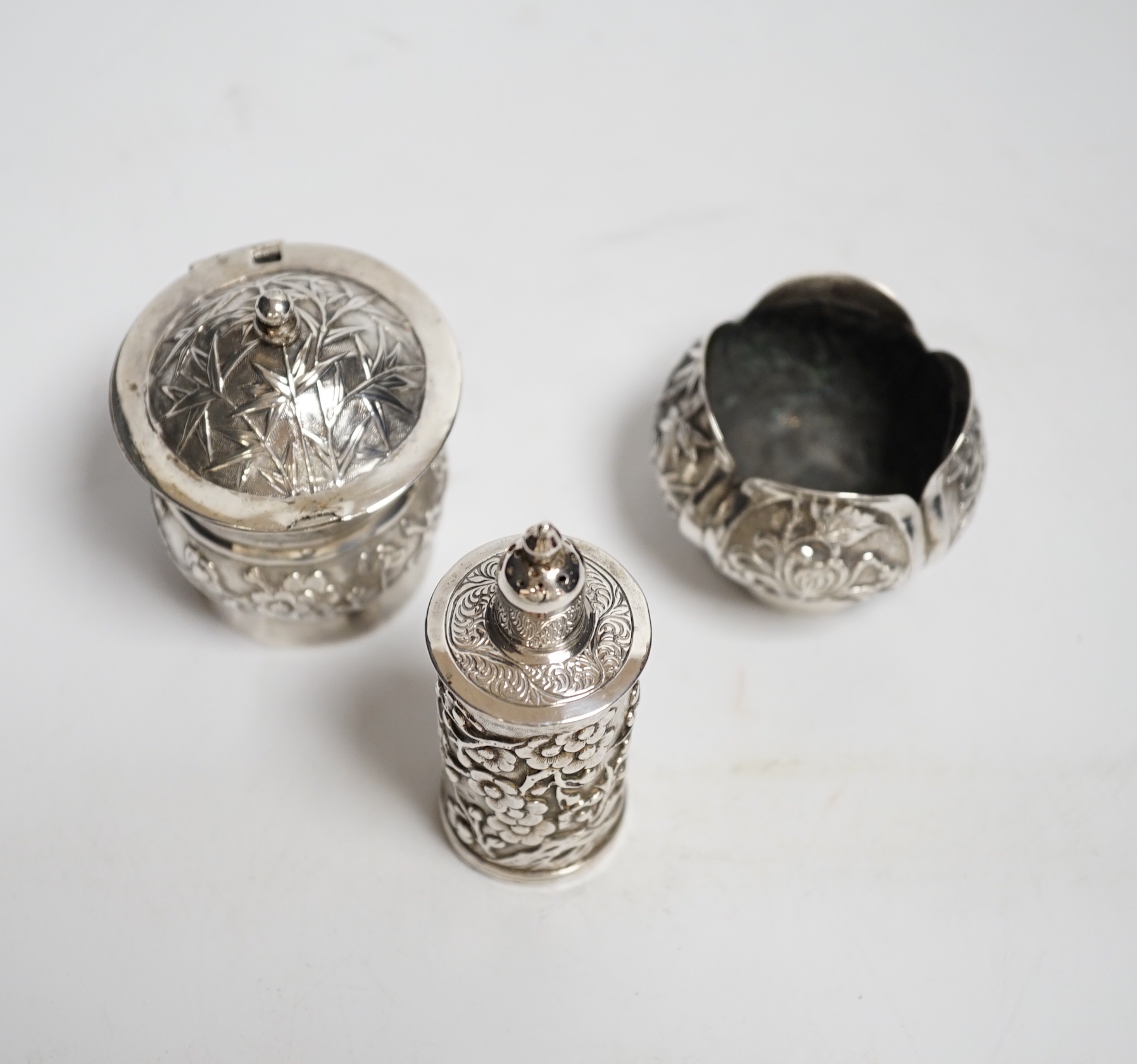 An early 20th century Chinese Export white metal three piece condiment set by Wang Hing, Hong Kong, 147 grams.